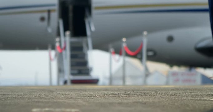 Businessman walking on a runaway 4k