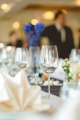 Empty wine glasses placed on a dinner table.