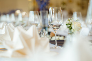 Empty wine glasses placed on a dinner table.
