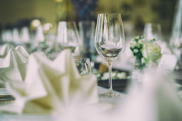 Empty wine glasses placed on a dinner table.