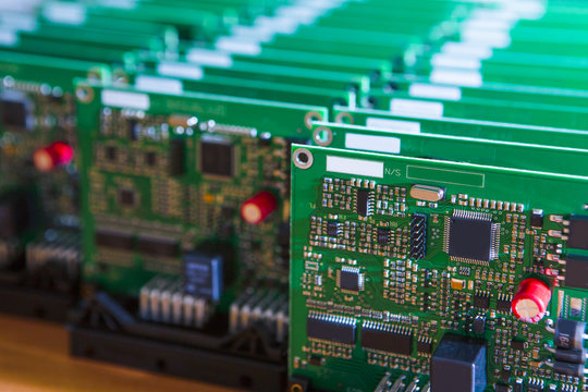 Closeup of Lot of Electronic Printed Circuit Boards with Lots of Surface Mounted Components.