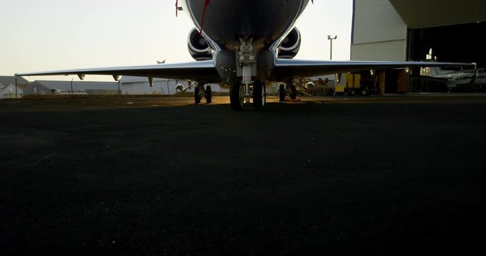 Private jet at hangar 4k