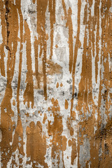 the texture of the damaged aluminum metal surface, gray metal with stripes of brown paint, abstract background