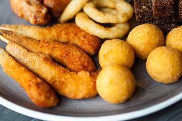 Large plate with snacks for beer served