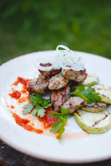 Pork shish kebab with grilled squash
