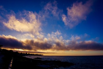 sun setting over the ocean