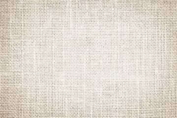 Fototapeta na wymiar Pastel abstract Hessian or sackcloth fabric or hemp sack texture background. Wallpaper of artistic wale linen canvas. Blanket or Curtain of cotton pattern with copy space for text decoration.
