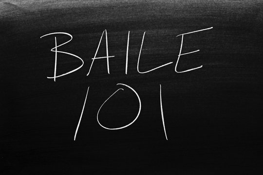 The words Baile 101 on a blackboard in chalk.  Translation: Dancing 101