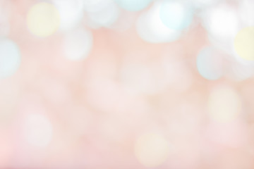 Blurred christmas snow lights on background. Design effect focus happy holiday party glow texture white wall paper pastel bokeh sun star shiny soft plain warm flare blur night light red xmas gray year
