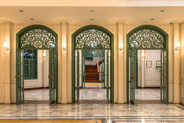 Classic of three green wooden door and marble floor vintage style interior decoration
