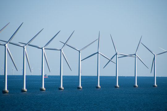 Close-up of an electric generating wind farm in the Baltic Sea between Germany and Denmark