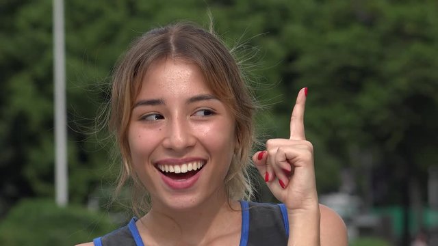 Teen Hispanic Girl Having An Idea
