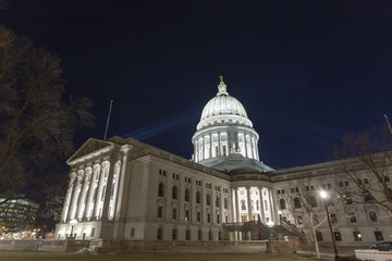 Dramatic view of the Wisconsin State Capitol building lit up at night