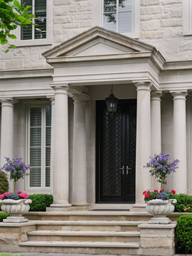 Front door of house with columns