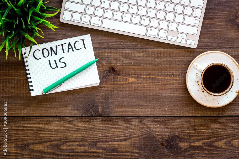 Poster template for contacts, background for contact information. lettering contact us in notebook on offic