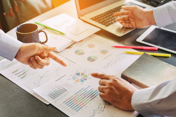 businessman investment consultant analyzing company financial report balance sheet statement...