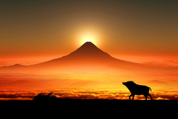 Fototapeta na wymiar 富士山の日の出とイノシシのシルエット 