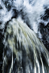 Water flows into a steel pipe.