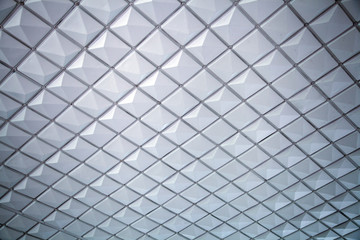 A close-up of a gray-white ceiling