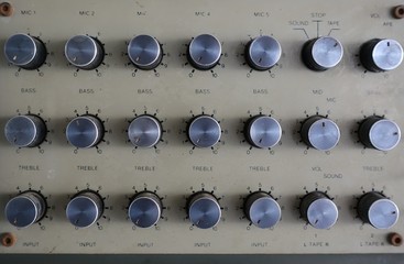 Amplifier and equaliser mixer switch of sound equipment. Selective focus.