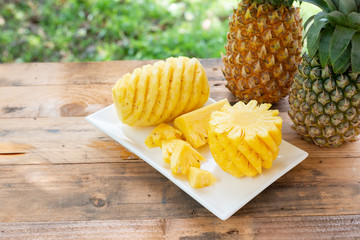 Pineapple on the wood  background