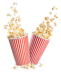 Falling popcorn in box isolated on a white background.