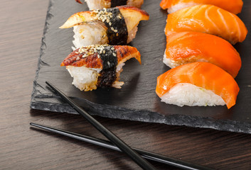 japanese cuisine, sushi set on a board