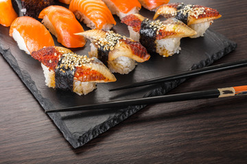 japanese cuisine, sushi set on a board