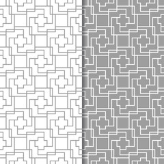 Fototapeta premium Gray and white geometric seamless patterns