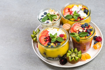 Serving tray with layered food in jars