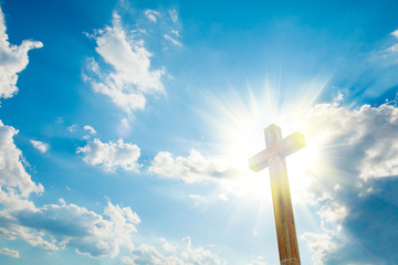 Wood cross on blue sky
