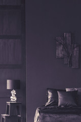 Dark violet bedroom interior