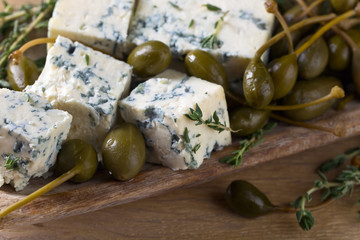 Blue cheese , capers and thyme.