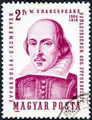 A stamp printed in Hungary shows a portrait image of William Shakespeare