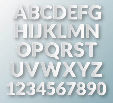 Floating paper letters and numbers of the alphabet