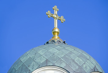 Fototapeta na wymiar The dome of the Church with a cross