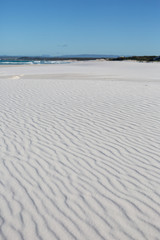 Fototapeta na wymiar White sand beach at The Bay of Fires, Tasmania, Australia