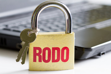 Rodo personal data protection concept with padlock and laptop