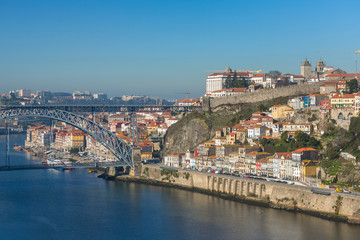 View of the historic city center with the famous ponte Dom Luiz bridge in Porto, Portugal