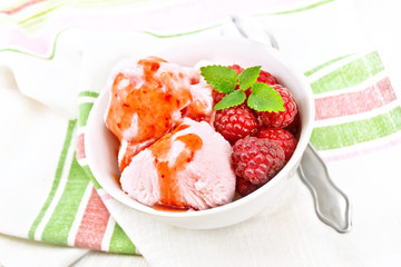 Ice cream crimson with syrup on board