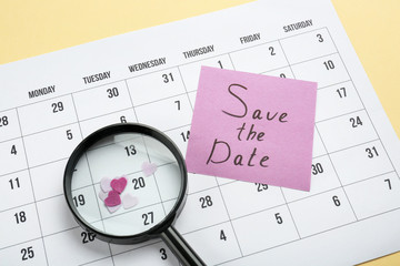 Magnifying glass and sheet of paper with text 