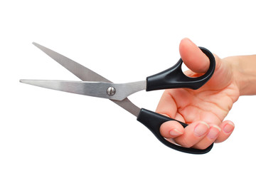 Hand is holding scissors isolated on a white background