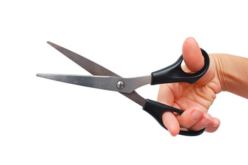Hand is holding scissors isolated on a white background
