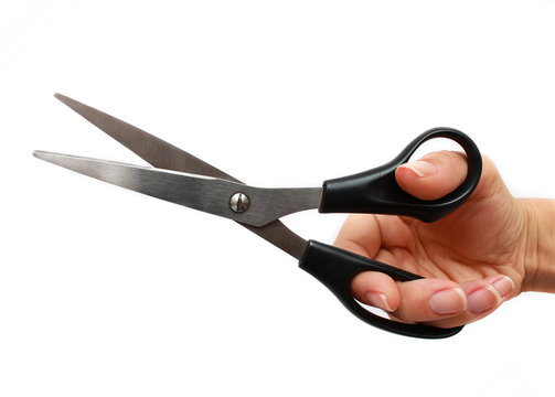 Hand Is Holding Scissors Isolated On A White Background