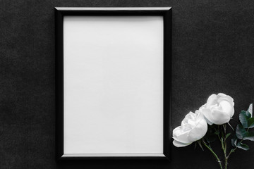Fresh white roses on the dark background. Condolence card. Empty place for emotional, sentimental...