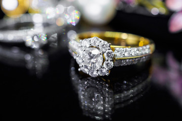 Jewelry diamond rings with reflection on black background