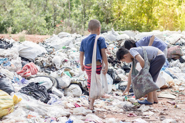 Poor children collect garbage for sale,, the concept of pollution and the environment,Recycling old...