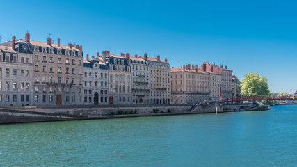 Fototapeta na wymiar Vieux-Lyon, beautiful facades on the quay, colorful houses in the center, on the river Saone, panorama 