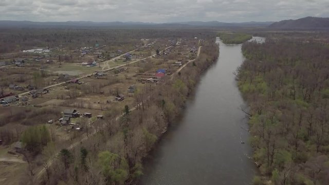 Amazing aerial view of Krasny Yar village, Russia. Krasny Yar is the capital of the Primorsky Udege - indigenous small peoples of the far north. The village stands on the river Bikin