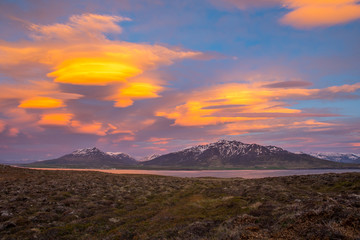 The sunset is reflected in the clouds